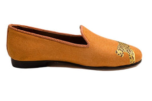 Orange linen slippers with orange grosgrain trimming, leopard embroidery on top and nubuck leather sole.