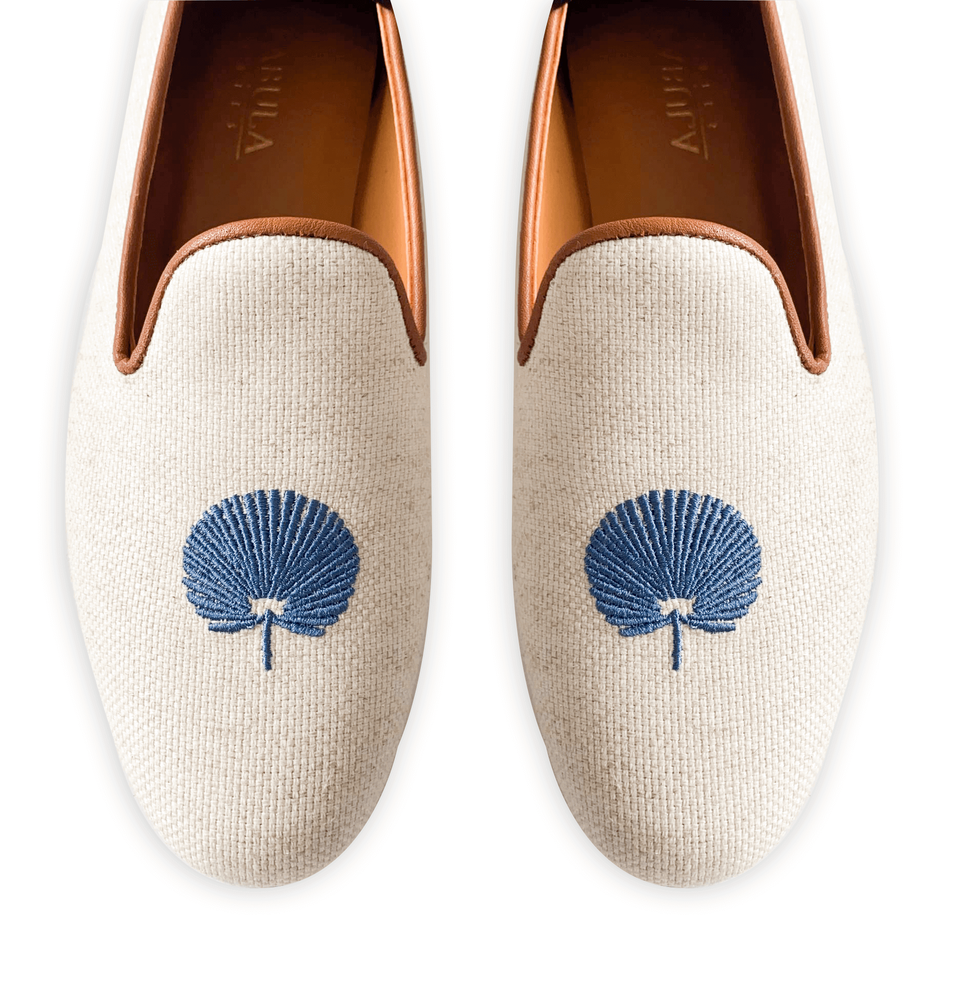 Beige linen slippers with brown leather trimming, navy embroidery on top and nubuck leather sole.