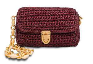 handmade burgundy crochet bag with a beige shoulder chain